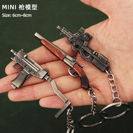 Hot Game Keychain Jewelry Weapon Mini Gun Model Metal Pendant Key Chain Fashion Chaveiro Bag Car Key Holders Gift For Kids Men