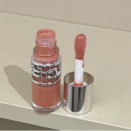 Flowing mirror lip gloss, waterproof and long-lasting luster, non stick to the cup, silky texture, natural makeup effect