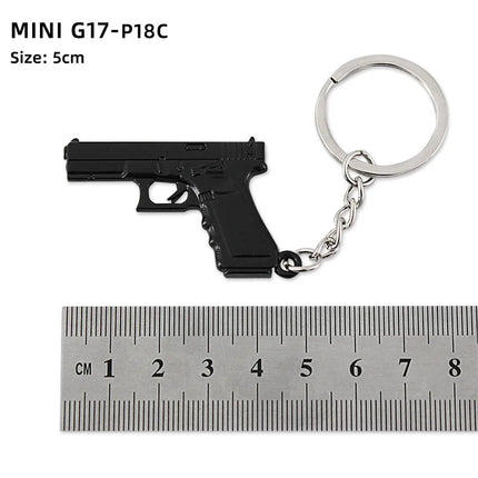 Hot Game Keychain Jewelry Weapon Mini Gun Model Metal Pendant Key Chain Fashion Chaveiro Bag Car Key Holders Gift For Kids Men